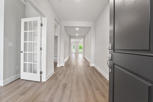  - kitchen with stainless steel appliances, wall chimney exhaust hood, dark wood-style flooring, backsplash, and recessed lighting