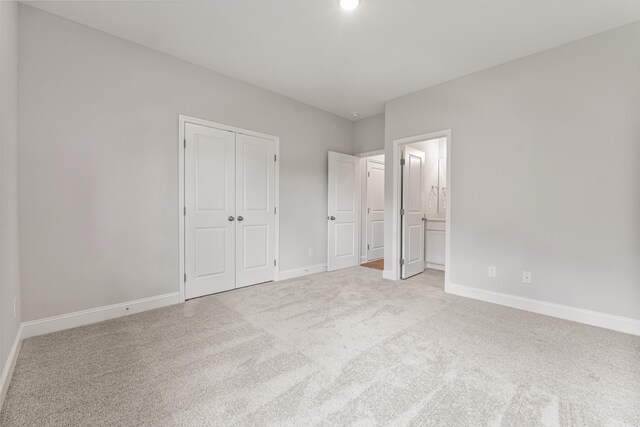 - laundry room with hookup for an electric dryer, washer hookup, and light tile patterned floors