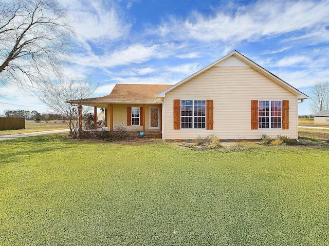 ranch-style house featuring a front lawn and crawl space