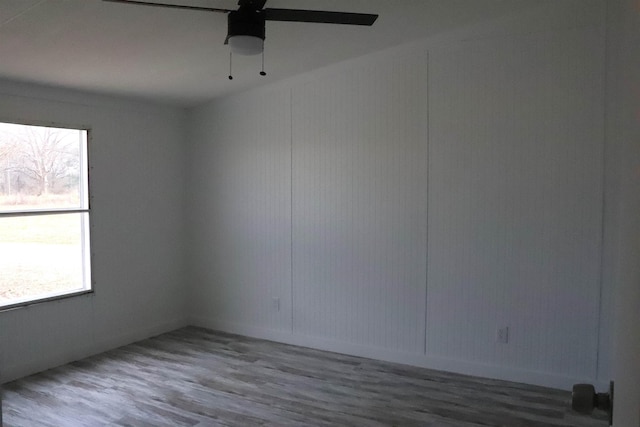 spare room featuring hardwood / wood-style flooring and ceiling fan