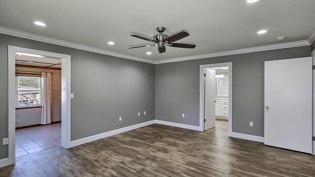 kitchen featuring ceiling fan, light tile patterned flooring, and ornamental molding