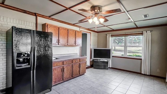 bathroom with crown molding, tile patterned flooring, and vanity