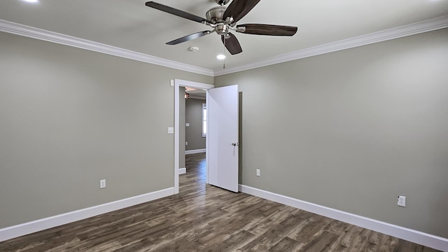 empty room featuring hardwood / wood-style floors, ceiling fan, and ornamental molding