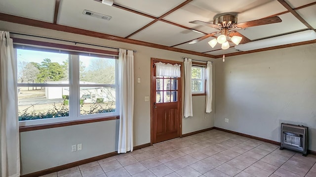 interior space featuring dark wood-type flooring, ceiling fan, and ornamental molding