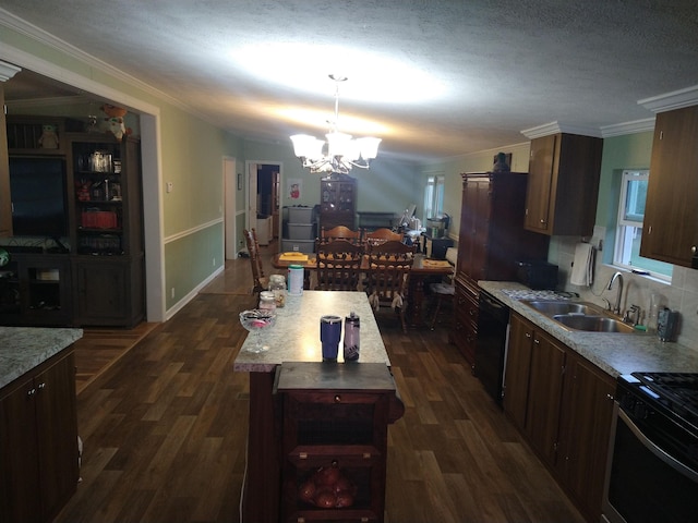 kitchen featuring a notable chandelier, dishwasher, dark hardwood / wood-style floors, and hanging light fixtures