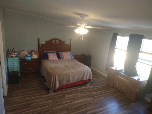 bedroom with dark hardwood / wood-style floors, ceiling fan, and ornamental molding