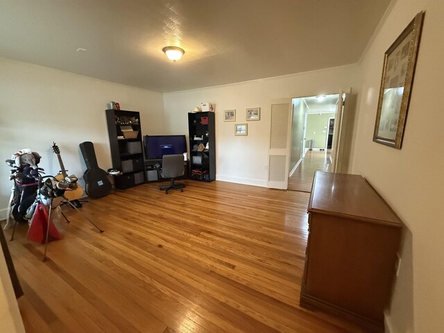  - home office with wood finished floors and baseboards