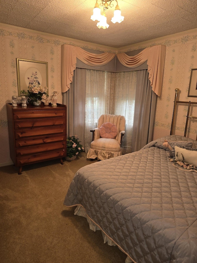 bedroom with ornamental molding, carpet floors, a textured ceiling, and a notable chandelier