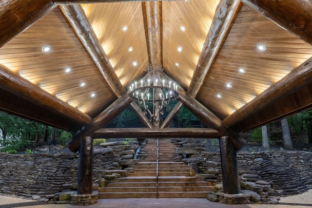 exterior details featuring an inviting chandelier