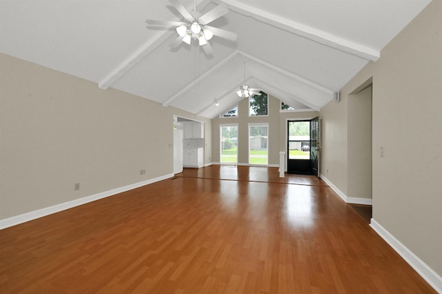  - unfurnished living room featuring a ceiling fan, wood finished floors, and baseboards