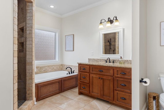 bathroom featuring vanity, a garden tub, a tile shower, crown molding, and toilet