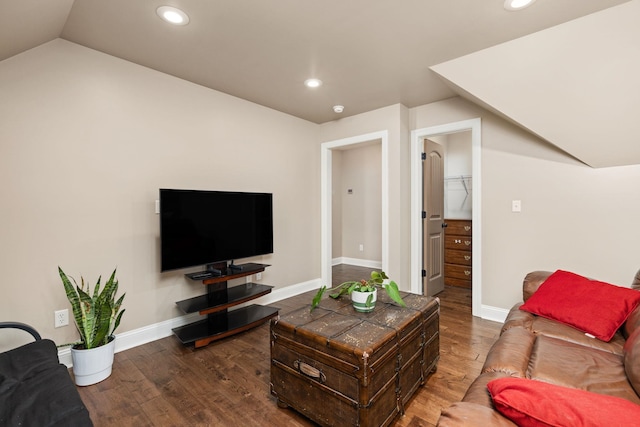 living area featuring recessed lighting, baseboards, lofted ceiling, and dark wood-style flooring