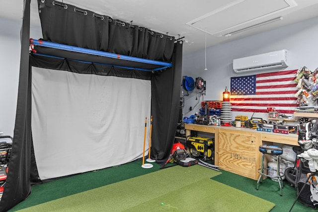 recreation room featuring golf simulator and an AC wall unit