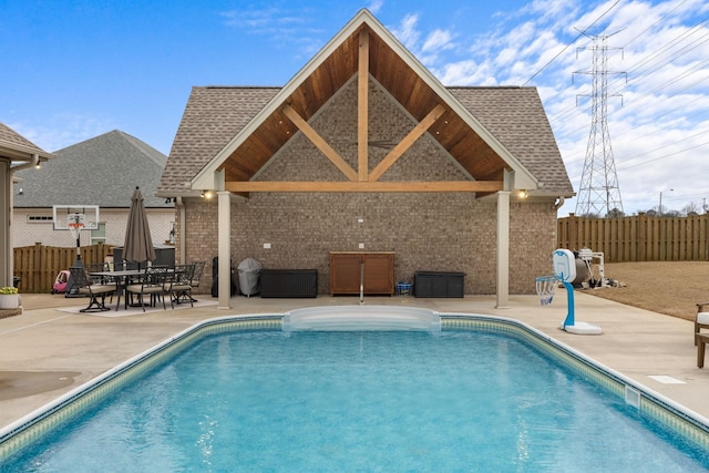 view of pool featuring fence, a patio area, and a fenced in pool