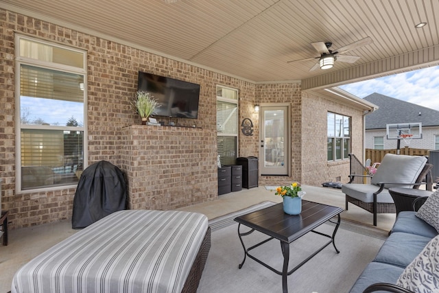 view of patio featuring outdoor lounge area and ceiling fan