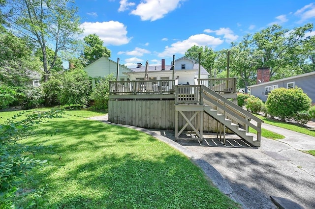 view of yard with a wooden deck