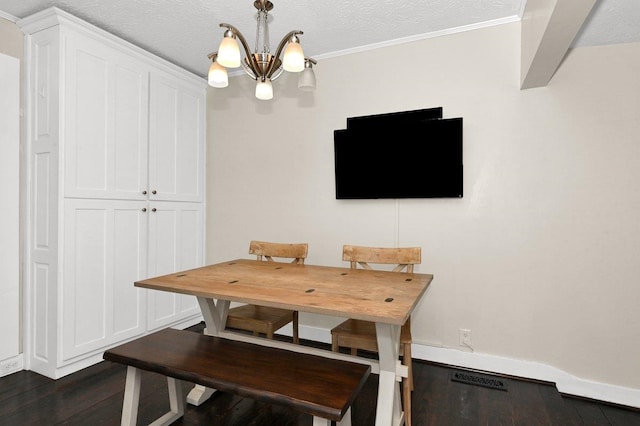 dining room featuring crown molding, a textured ceiling, and a notable chandelier