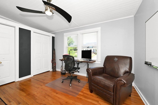 office featuring ceiling fan, hardwood / wood-style floors, and ornamental molding