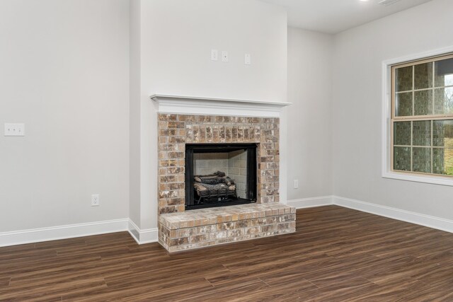 kitchen featuring built in microwave, hanging light fixtures, light hardwood / wood-style floors, black electric cooktop, and custom range hood