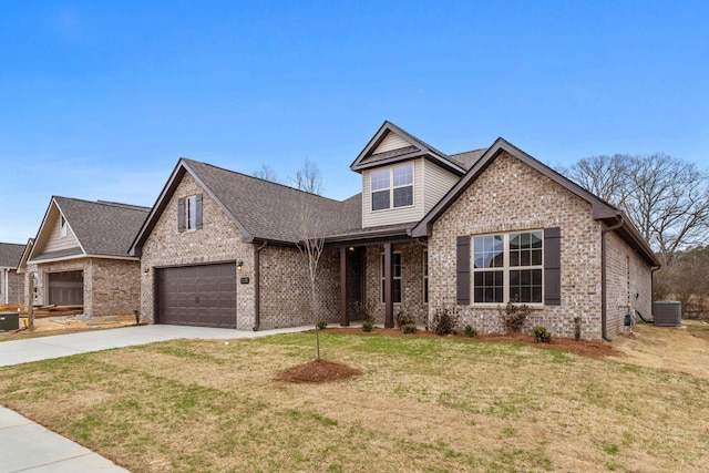 view of front of home with central AC, a garage, and a front lawn