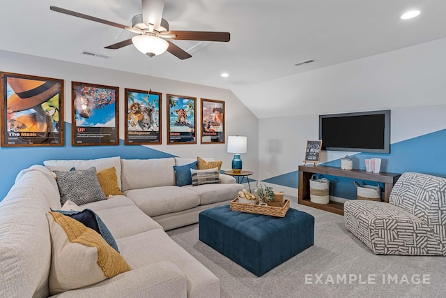 living room with ceiling fan and lofted ceiling