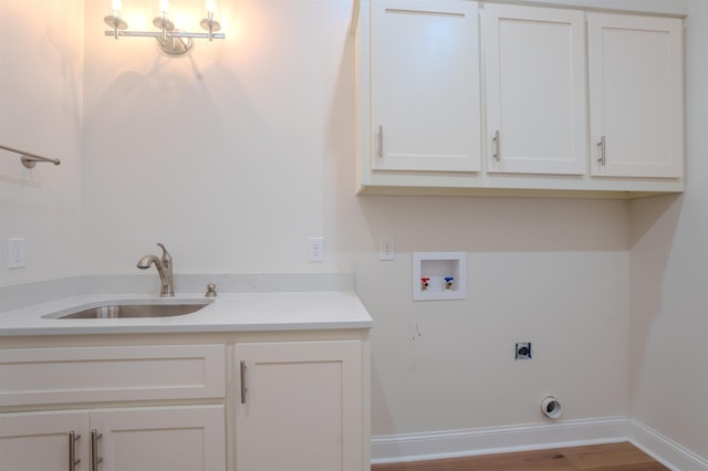 laundry room featuring washer hookup, cabinets, hookup for an electric dryer, and sink