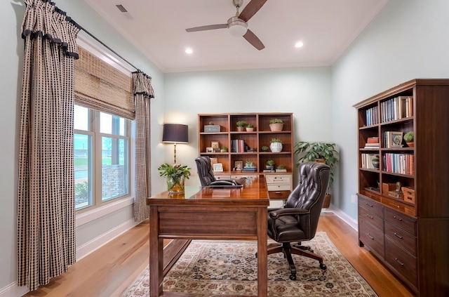 office area with light wood-type flooring and ceiling fan