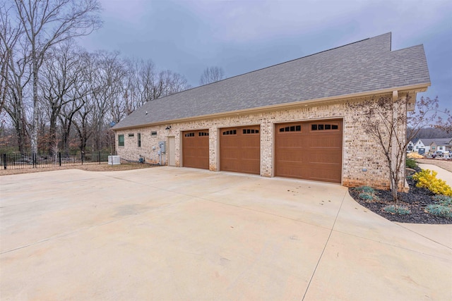 view of property exterior featuring a garage