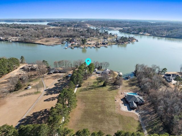 drone / aerial view with a water view