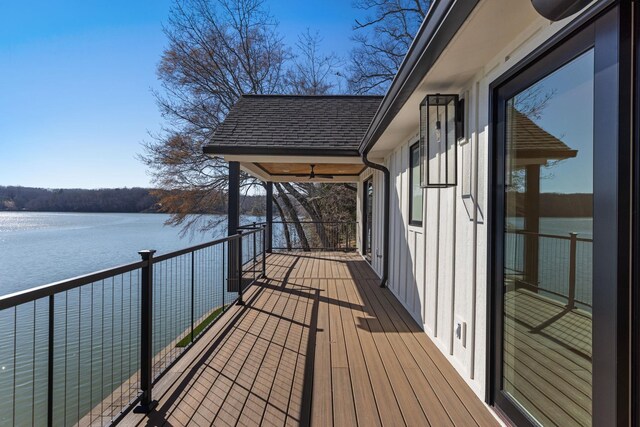 deck featuring a water view