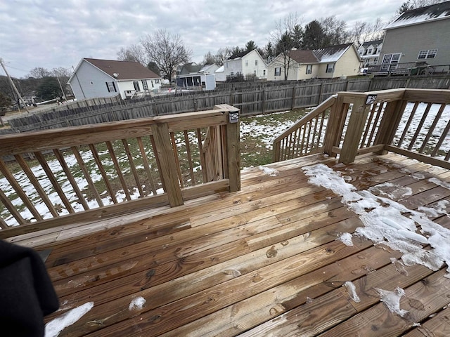 view of snow covered deck