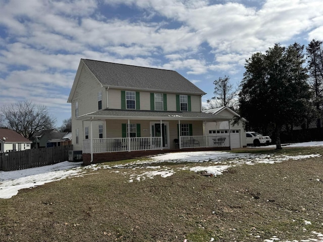 view of front of home with covered porch, a garage, central AC unit, and a lawn