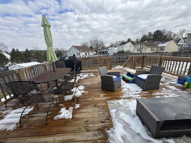 view of snow covered deck