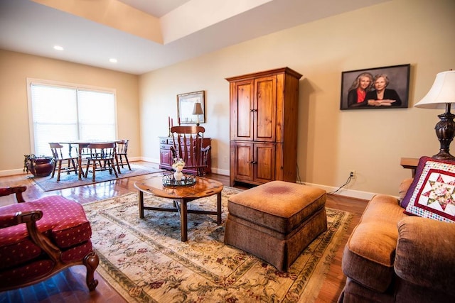  - living room with baseboards, wood finished floors, and recessed lighting