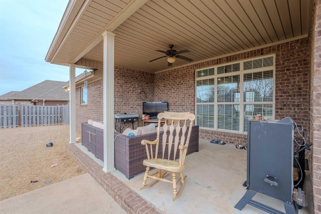 view of patio / terrace with ceiling fan and an outdoor hangout area