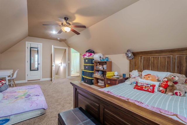 bedroom featuring ceiling fan, lofted ceiling, and light carpet