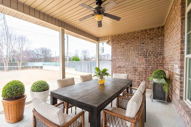  - view of patio with outdoor dining area and ceiling fan
