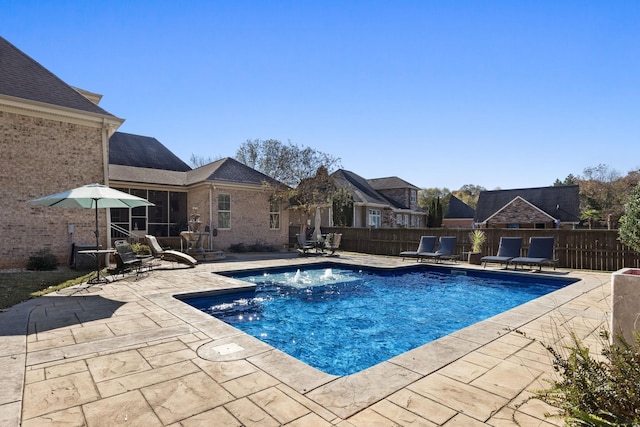 view of pool featuring a patio