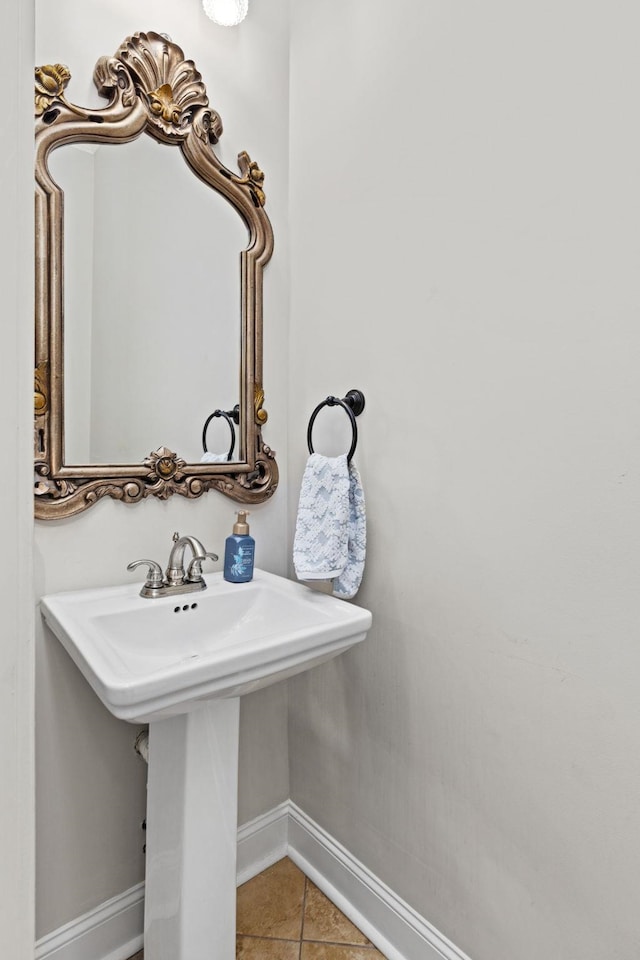 bathroom with tile patterned floors and sink