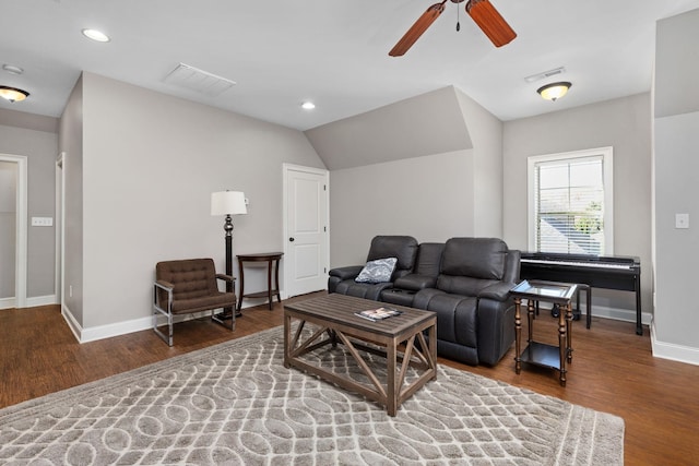 living room with hardwood / wood-style floors and ceiling fan