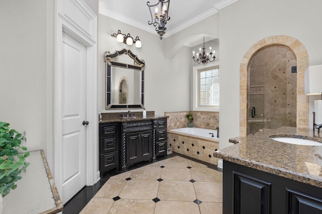 bathroom featuring an inviting chandelier, tile patterned floors, vanity, independent shower and bath, and ornamental molding