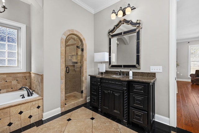 bathroom with tile patterned flooring, vanity, independent shower and bath, and crown molding