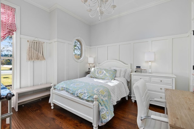 bedroom featuring ornamental molding, dark wood-type flooring, and a notable chandelier