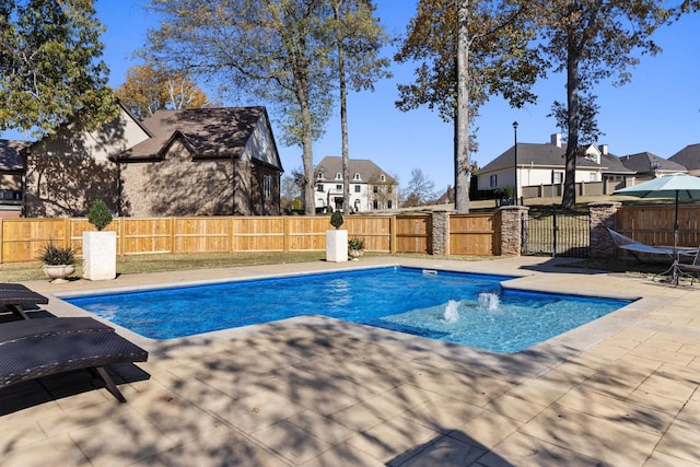 view of pool featuring a patio