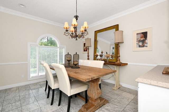 dining space with ornamental molding and a notable chandelier