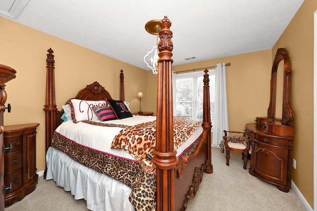 bedroom featuring light carpet