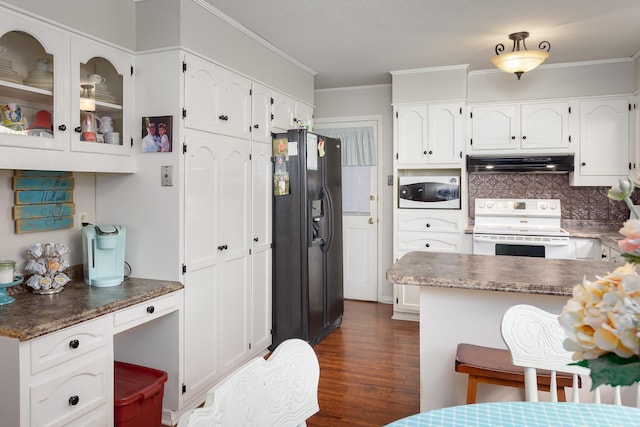 kitchen with white cabinets and white appliances