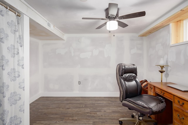 office area featuring ceiling fan and dark hardwood / wood-style flooring