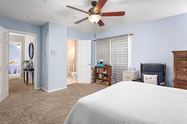 bedroom with light carpet, a textured ceiling, ensuite bathroom, and ceiling fan