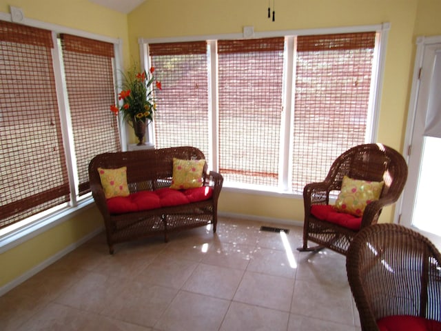 living area featuring tile patterned floors